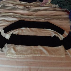 it is a long sleeve, a cropped long sleeve shirt